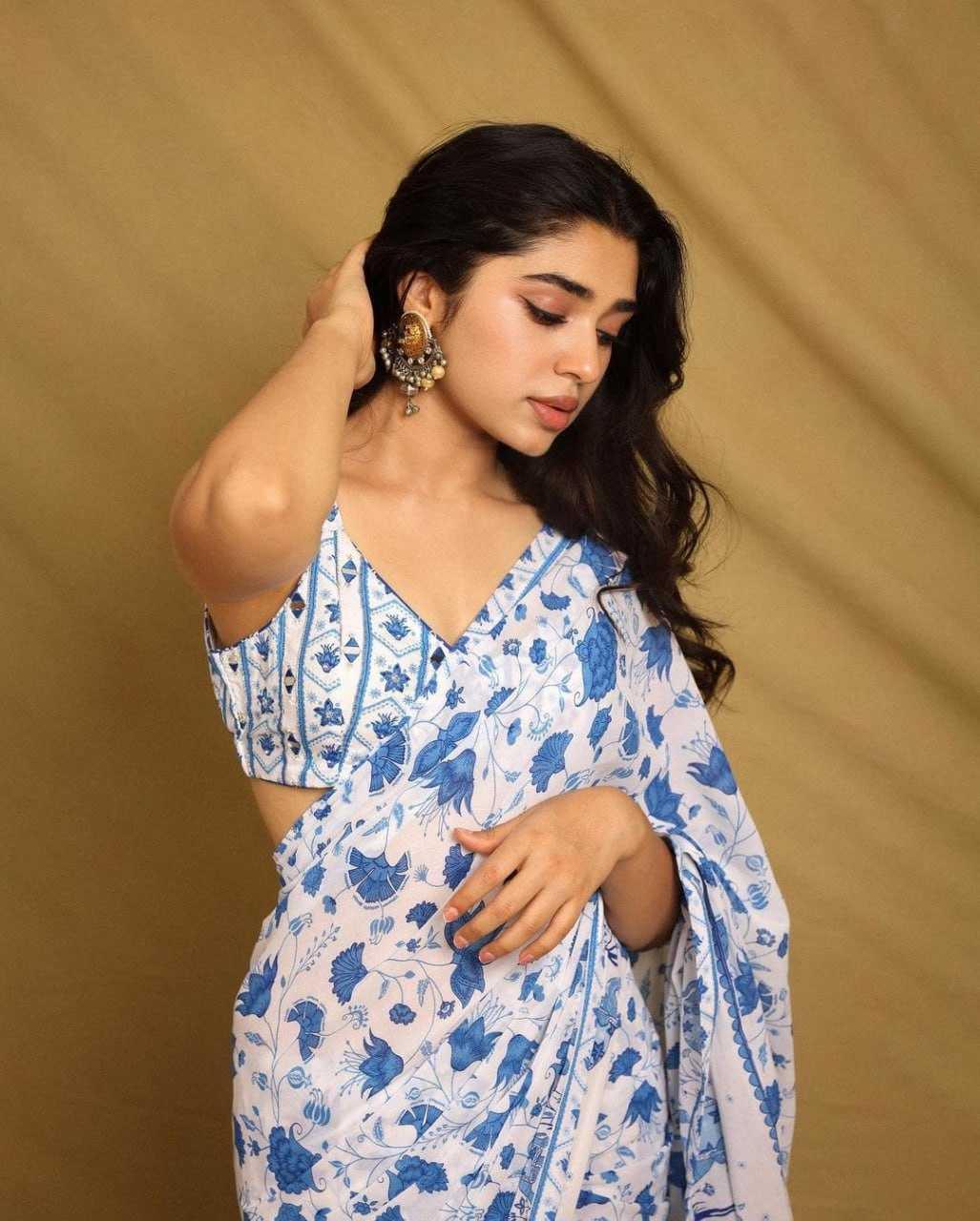 White Georgette Saree with Elephant Print & Lace Border - House of ViDi