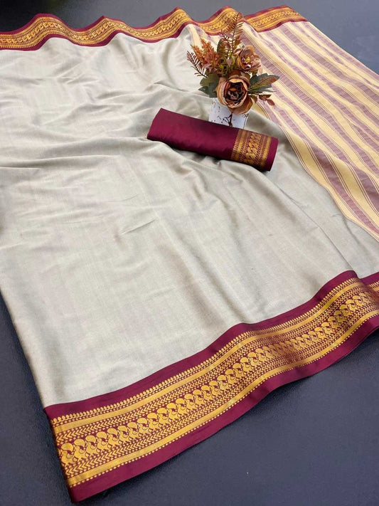 White Aura Cotton Designer Saree with Rich Border & Chitt Pallu – Festive & Elegant Wear