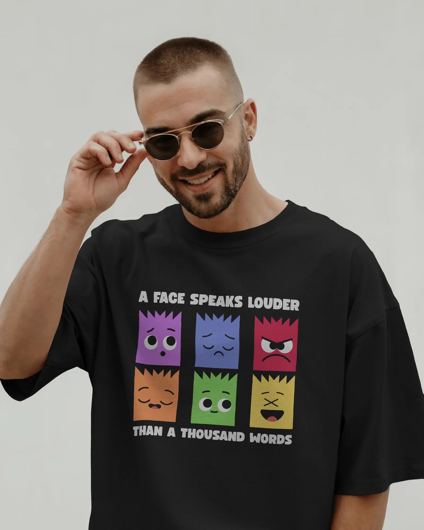 A Face Speaks Louder Oversized T-shirt | Emoji Expression Graphic Tee